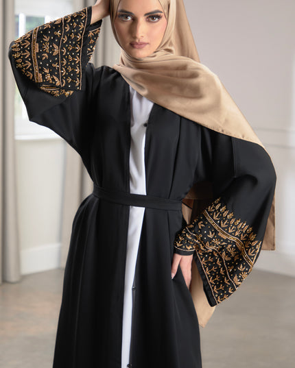 black abaya with gold embellished sleeves