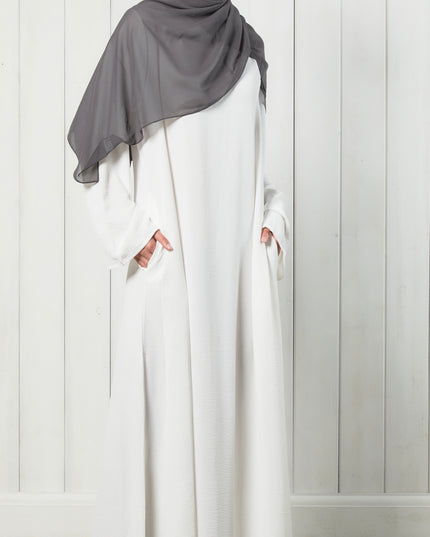 white closed abaya with pockets